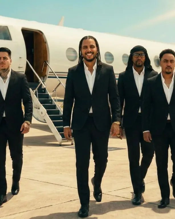 The crew in suits on the tarmac